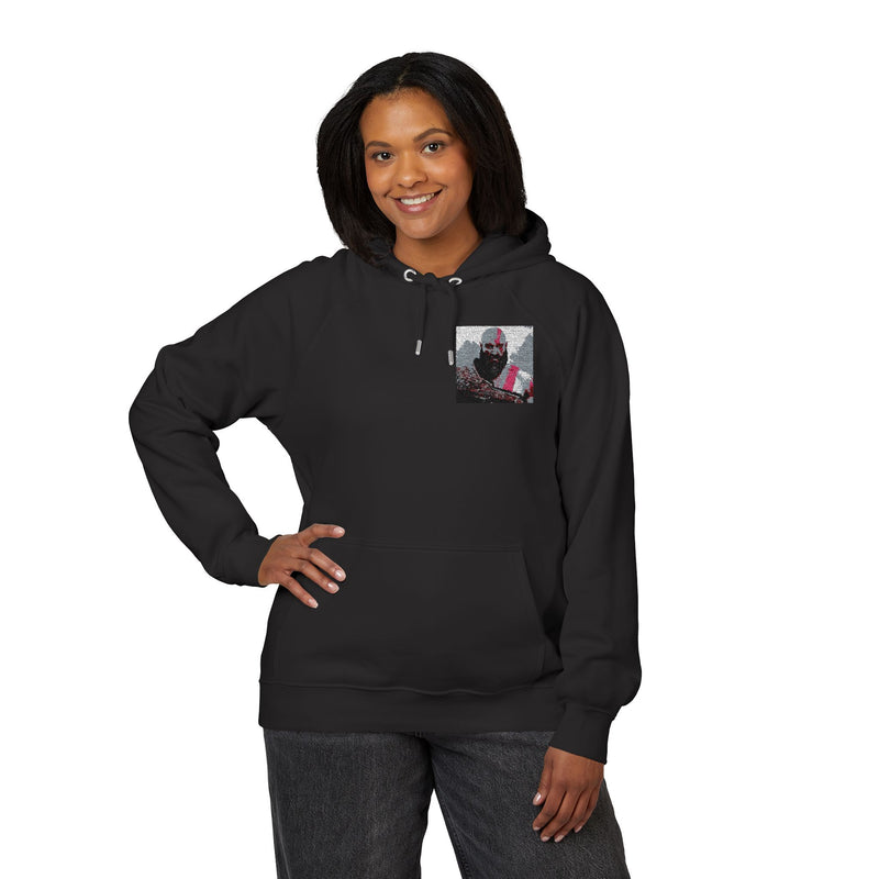 Person wearing a black hoodie with a graphic on the chest against a white background
