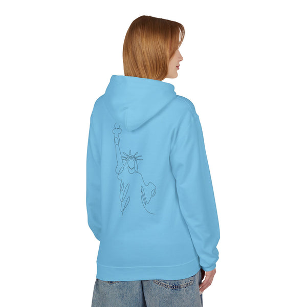 Person wearing a light blue hoodie with a design on the back, standing against a white background