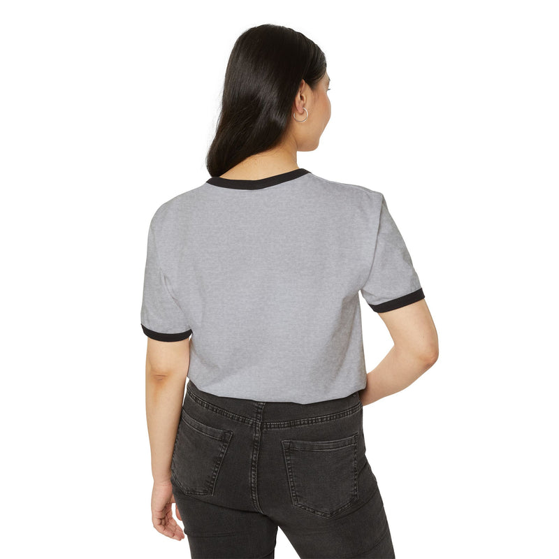 Person wearing a gray t-shirt with black trim on a white background