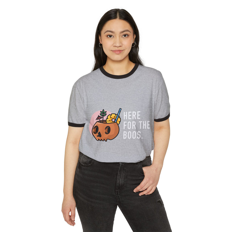 Person wearing a gray t-shirt with a Halloween-themed design and text.