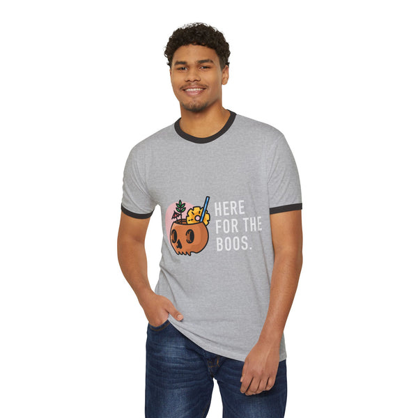 Man wearing a gray ringer t-shirt with a graphic and text on a white background