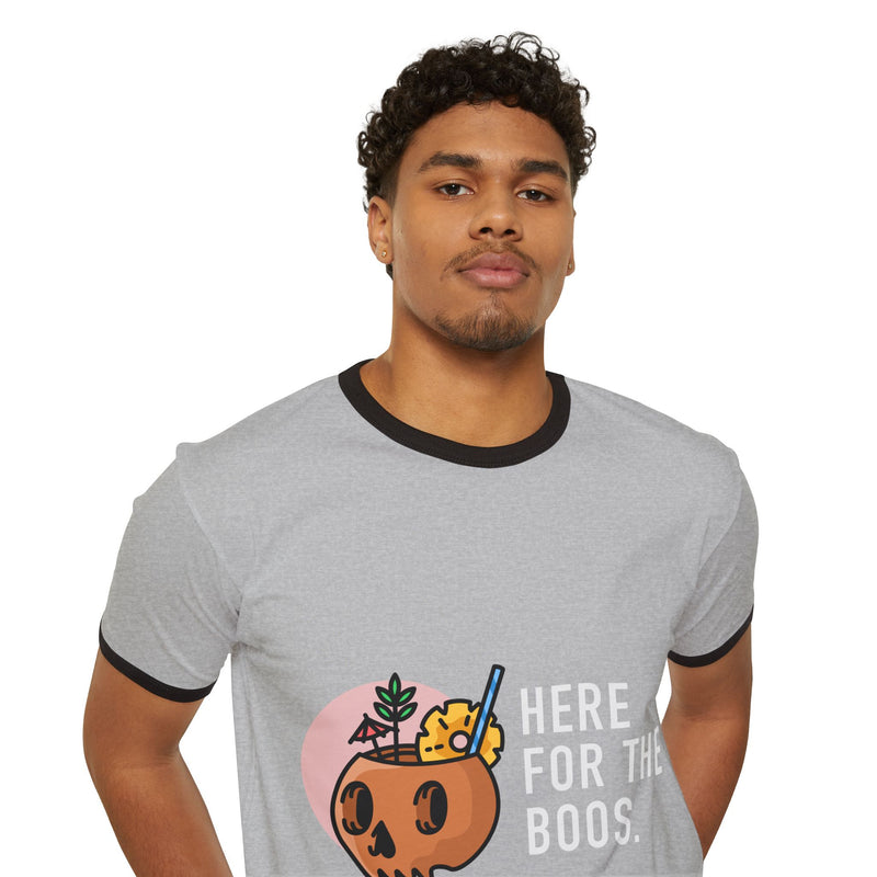 Man wearing a gray t-shirt with a graphic and text on a white background