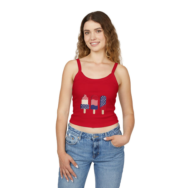 Woman wearing a red tank top with graphic design on a white background