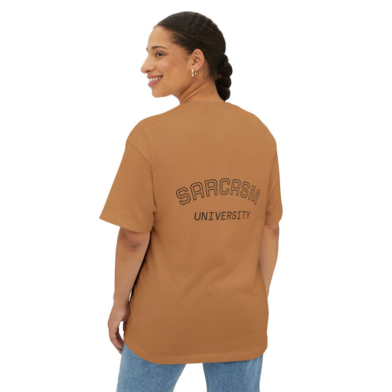 Person wearing a brown t-shirt with 'SARCASM UNIVERSITY' text on the back, standing against a white background.